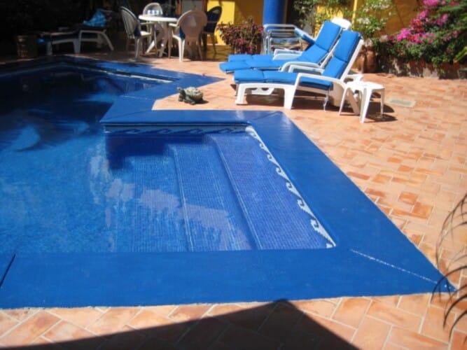 Sparkling Pool with Lounge Chairs